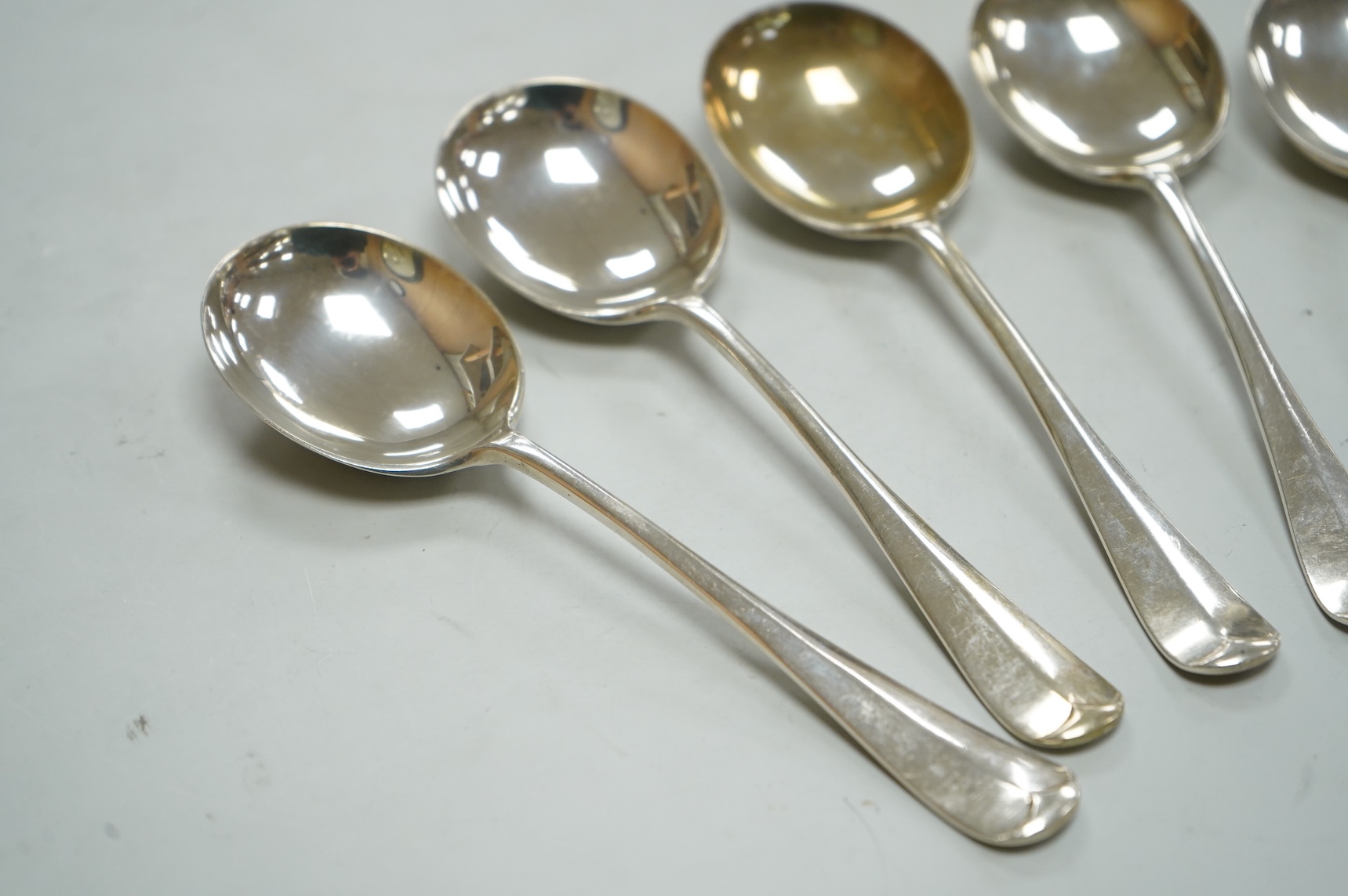 A set of five George V silver Hanoverian rat tail patter soup spoons, Walker & Hall, Sheffield, 1935, 17.9cm, 10.6oz.